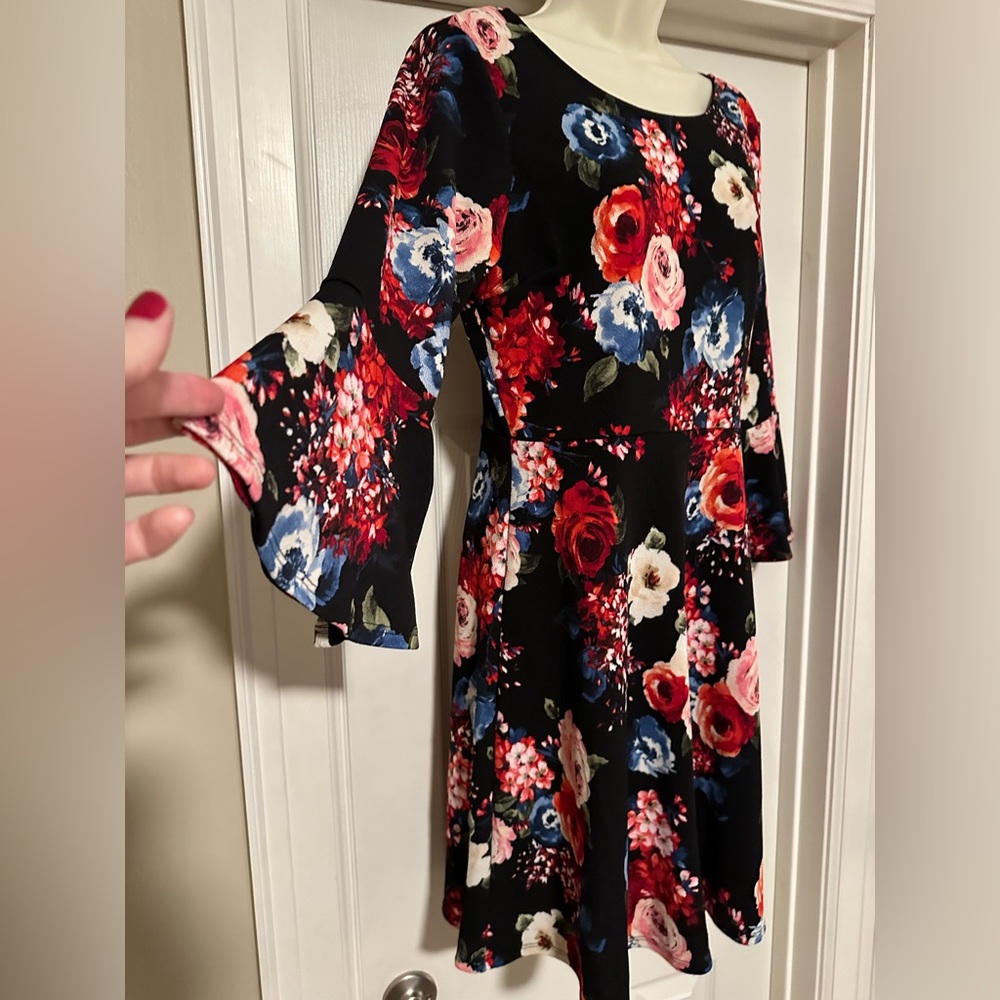 NWT Slip on relaxed fit, modest dress, 3/4 bell sleeves. Stretchy no-iron fabric